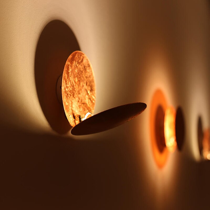 Lumi Wall Light – Elegant Rotating LED Wall Lamp with Golden Discs