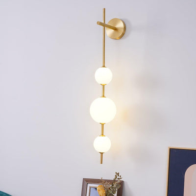 Vertical Globe Wall Light – Elegant Gold Wall Lamp with Frosted Glass Shade