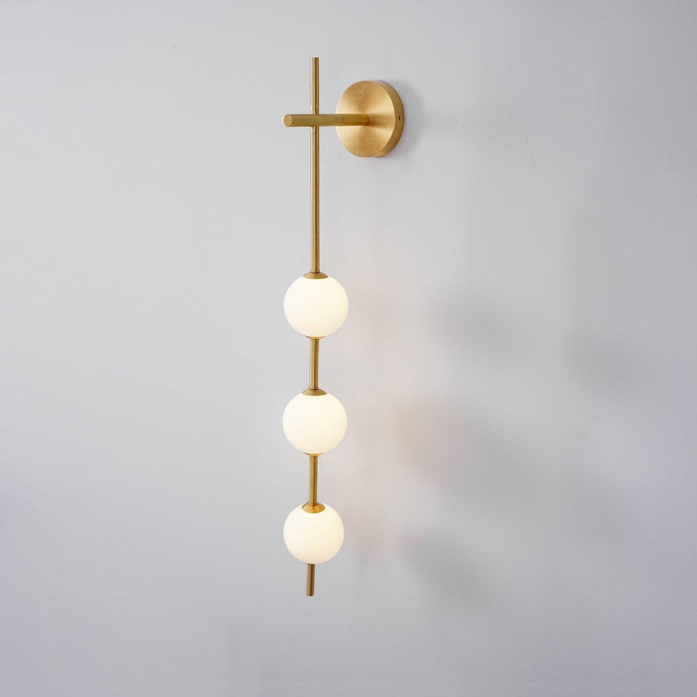 Vertical Globe Wall Light – Elegant Gold Wall Lamp with Frosted Glass Shade